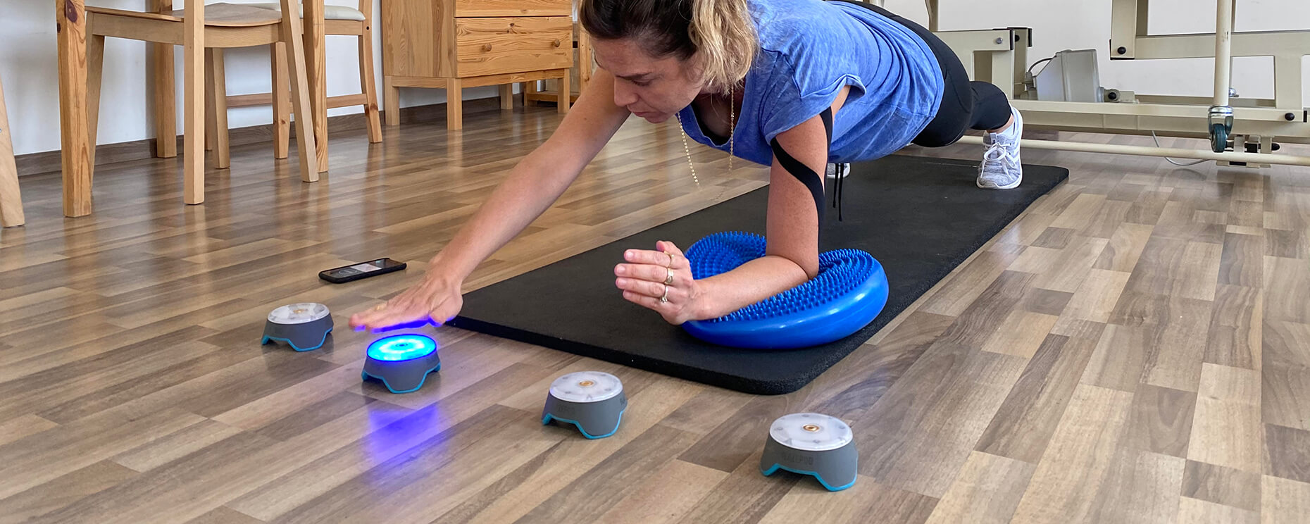 Woman in Physiotherapy using BlazePods