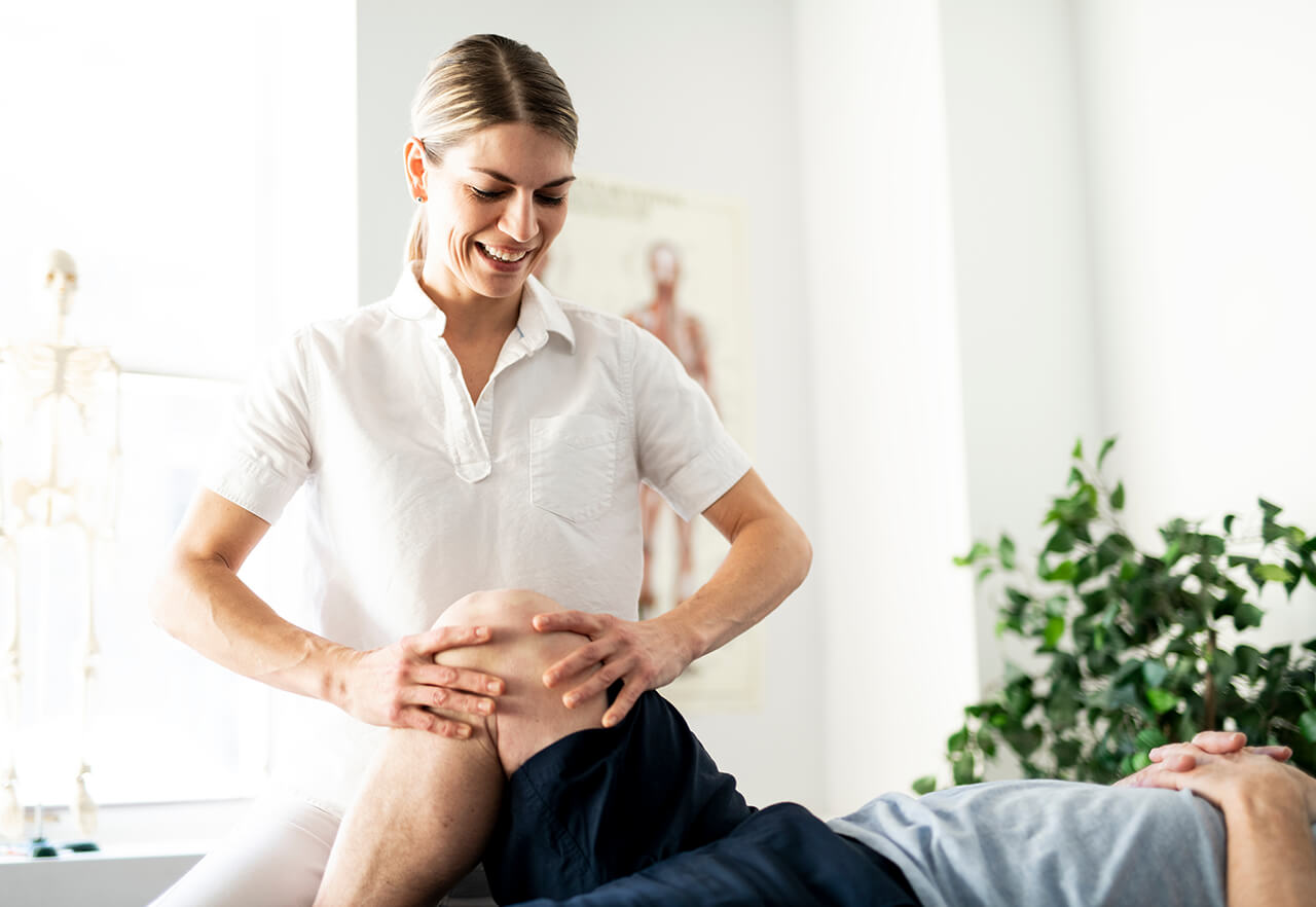Physio treating customer